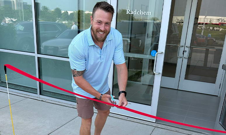 New CEO Person Cutting Ribbon